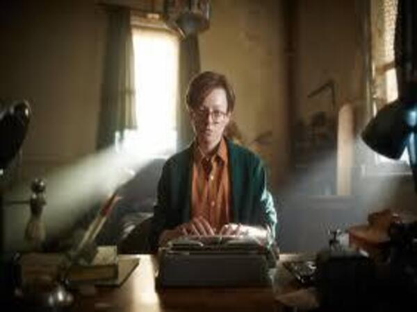 Predestination movie Sarah working on typewriter