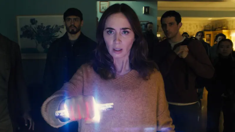 Margaret using a flashlight while investigating a strange anomaly in Disclosure Day