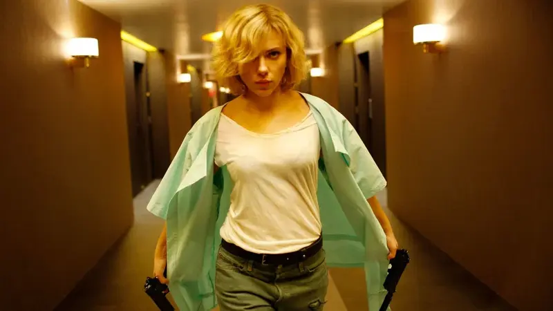 Lucy walking through the hotel with guns after the CPH4 changes begin